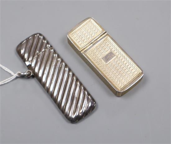 A Victorian silver gilt combination vest case and pill box by Yapp & Woodward, Birmingham, 1852 and a later silver bodkin case.